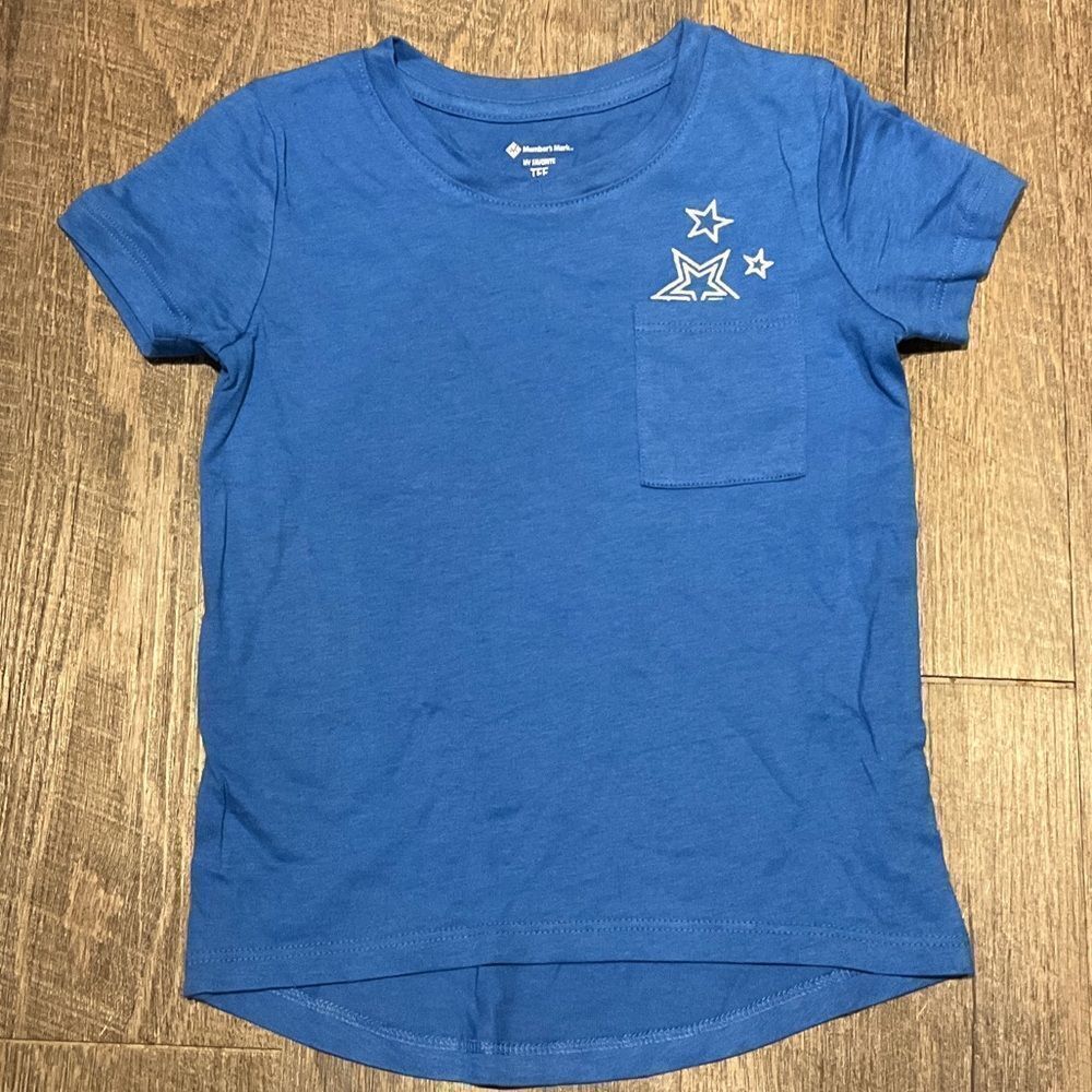 Members mark blue , embroidered star figure. Various sizes available.